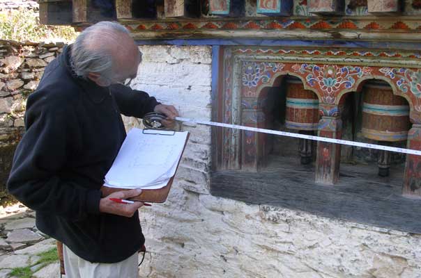 Architect Pierre Pichard taking measurements