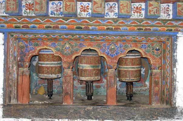 Prayer wheels around the temple