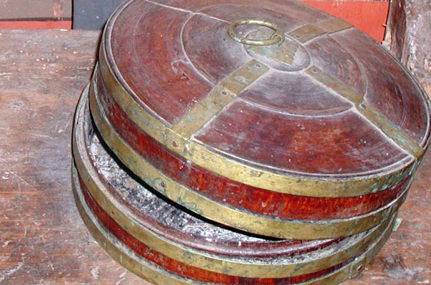 Wooden butter container made of bamboo bark and wood, and reinforced with grass